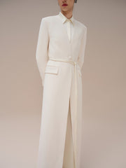 Manteau long structuré en laine mélangée avec col tailleur, ourlet fendu et poche à rabat