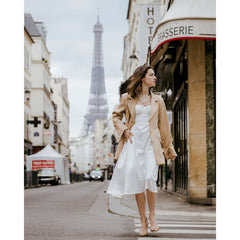 Silk bustier midi dress with soft flare hem and cutout back detail for elegant styling