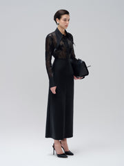 Jupe midi taille haute en cuir vegan avec coutures ajustées et fente au dos