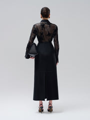 Jupe midi taille haute en cuir vegan avec coutures ajustées et fente au dos