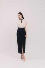Sleeveless Pleated Blouse with Ruffled High Neck and Contrast Ribbon Tie for Elegant Styling