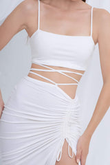 Silk bodycon midi dress with ruched detailing, strappy waist and high side slit