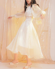 Flowy organza midi dress with puff sleeves and smocked waist for elegant movement