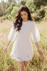 A-line puff sleeve mini organza dress with gathered waist and lightweight sheer structure