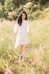 A-line puff sleeve mini organza dress with gathered waist and lightweight sheer structure
