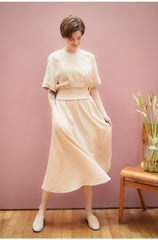 Robe midi en lin avec taille smockée et manches courtes