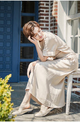 Robe midi en lin avec taille smockée et manches courtes