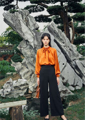 Pantalon large taille haute en lin avec coupe ajustée