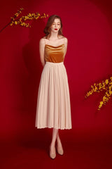 Velvet camisole top with draped cowl neckline and slim shoulder straps for elegant layering