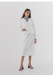 Blazer en lin boutonné à col en V et poches pour femme