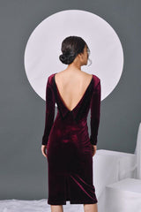 Fitted velvet midi dress with long sleeves and deep V-back for elegant evening styling