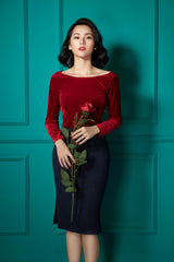 High-waisted velvet pencil skirt with side slit and textured stretch fit for elegant styling