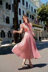 Jupe midi plissée en organza avec silhouette évasée et ceinture ajustée pour un style élégant