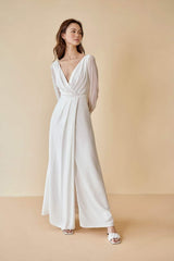 Silk maxi dress with sheer long sleeves and pleated wrap front for timeless elegance