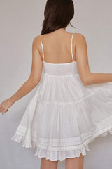Lightweight organza mini dress with ruffle trim and adjustable tie shoulder straps