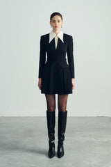 Tailored wool mini dress with oversized contrast collar and pleated skirt for chic formal flair