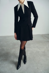 Tailored wool mini dress with oversized contrast collar and pleated skirt for chic formal flair