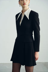 Tailored wool mini dress with oversized contrast collar and pleated skirt for chic formal flair